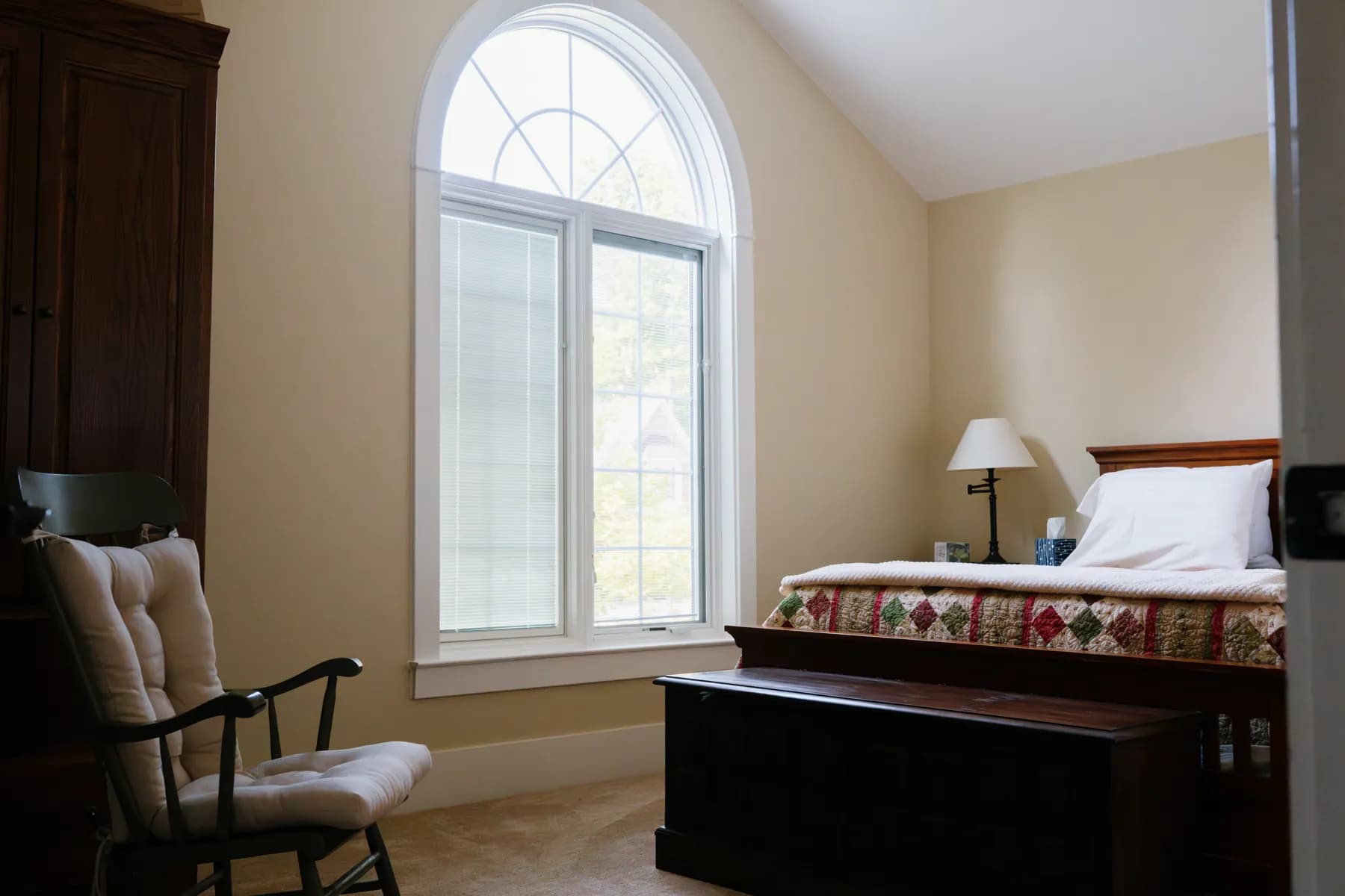 Bedroom with a new arch-top window, Ann Arbor