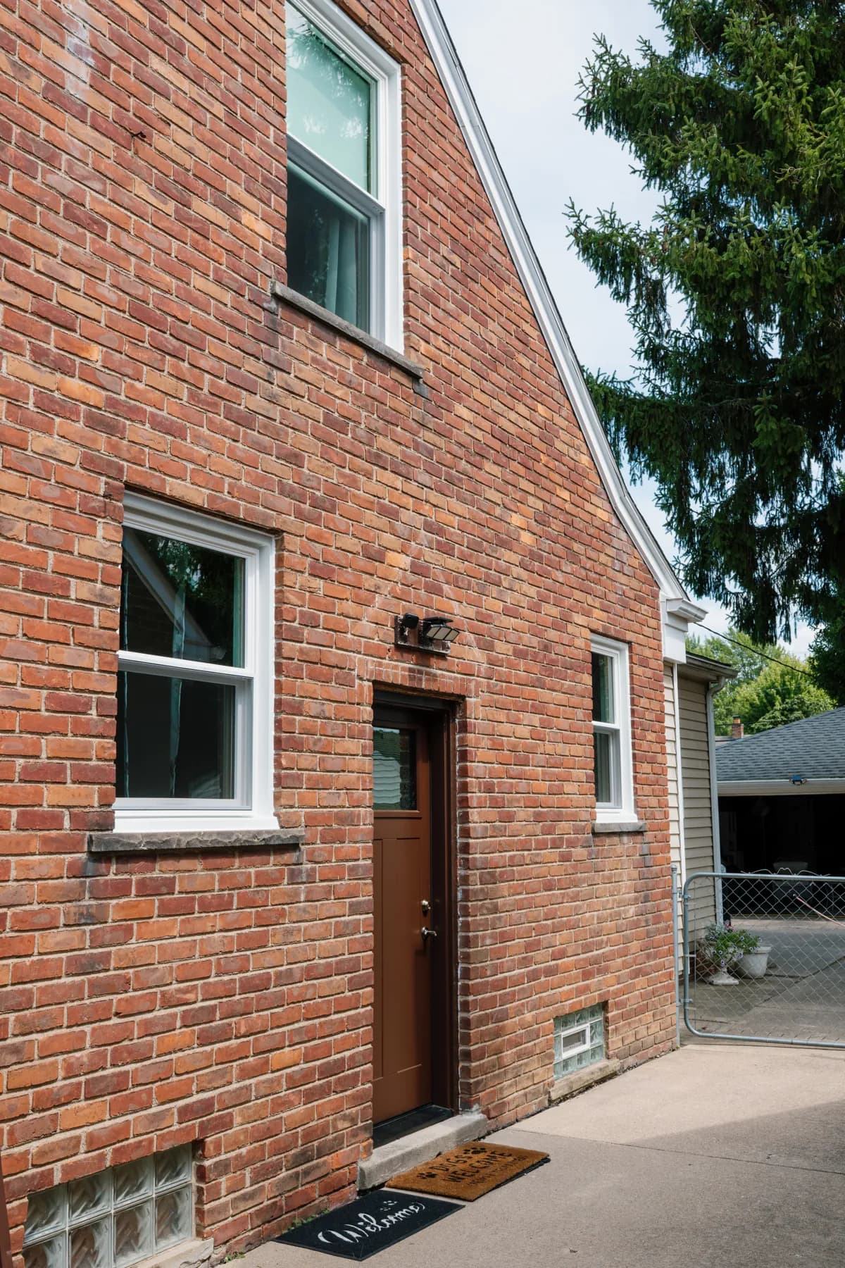 Side entry door with new windows above it