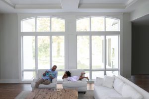 Large fiberglass picture windows in a living room